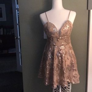 Nude dress with sequin flowers
